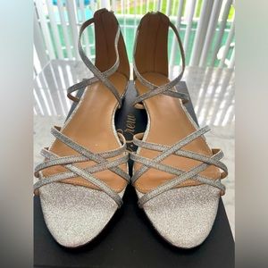 JCrew silver wrap flat sandals with zip up back.